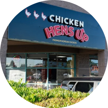 Hens Up Chicken logo