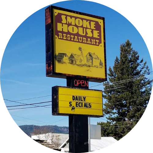 Smokehouse Restaurant logo